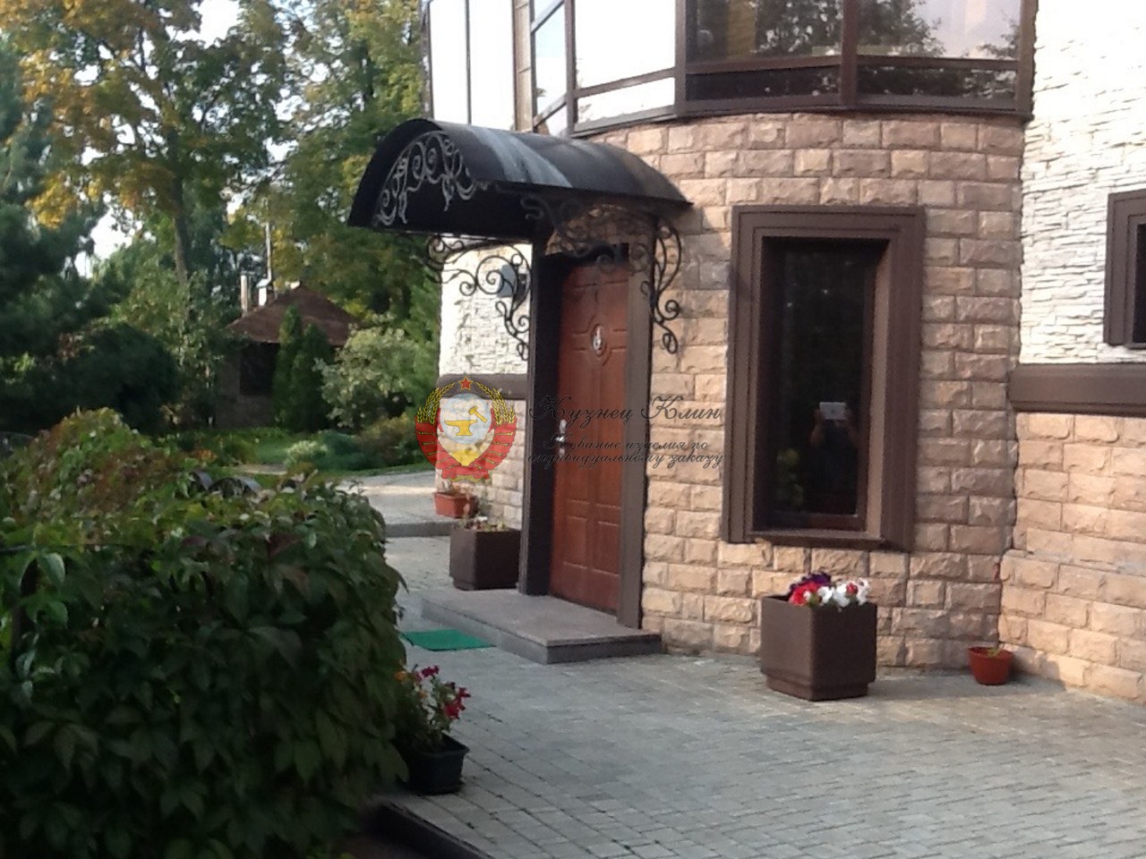 Кованый козырек дуговой