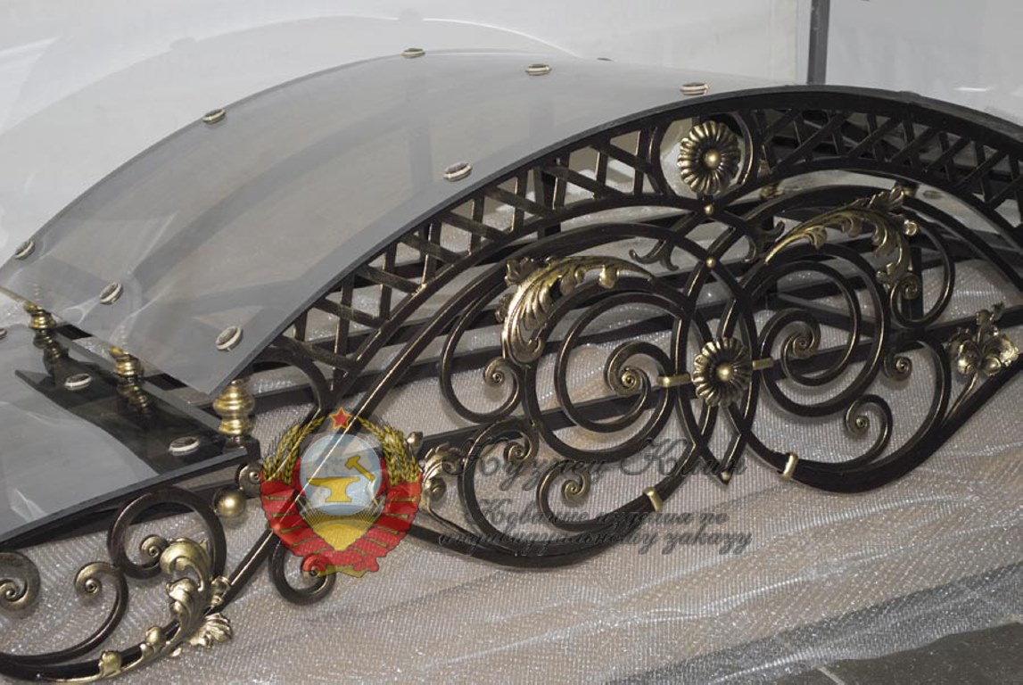 Кованый козырек ажурный
