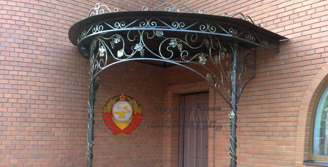 Кованый козырек виноград