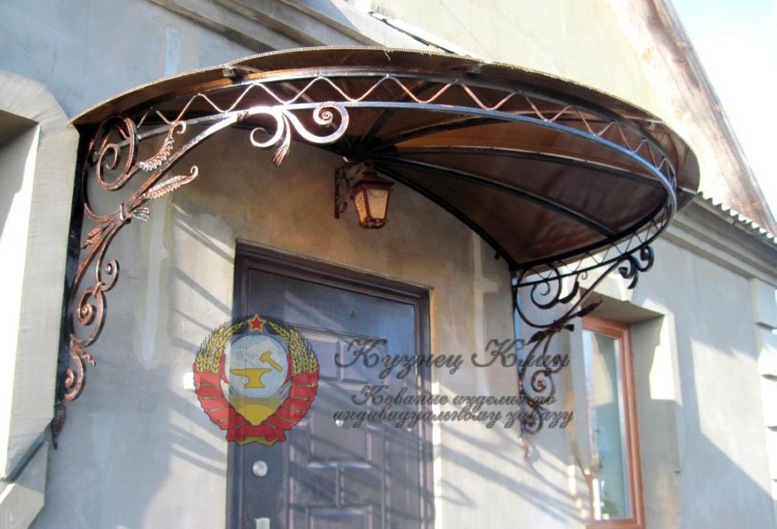 Кованый козырек лучик