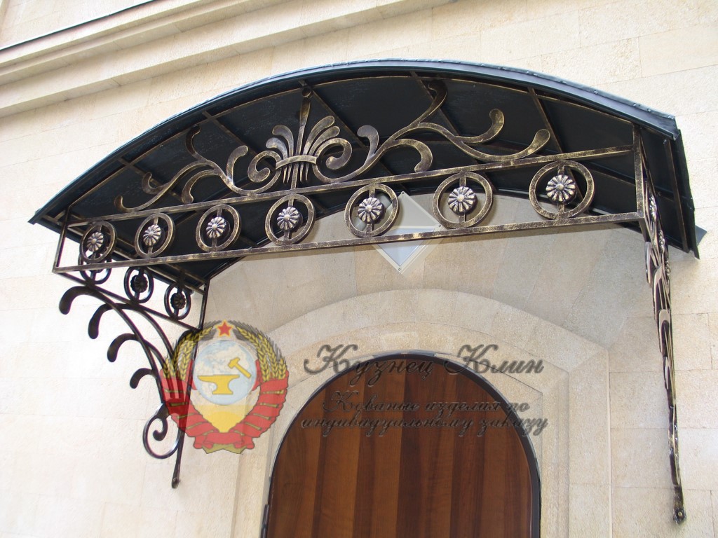 Кованый козырек солнышко