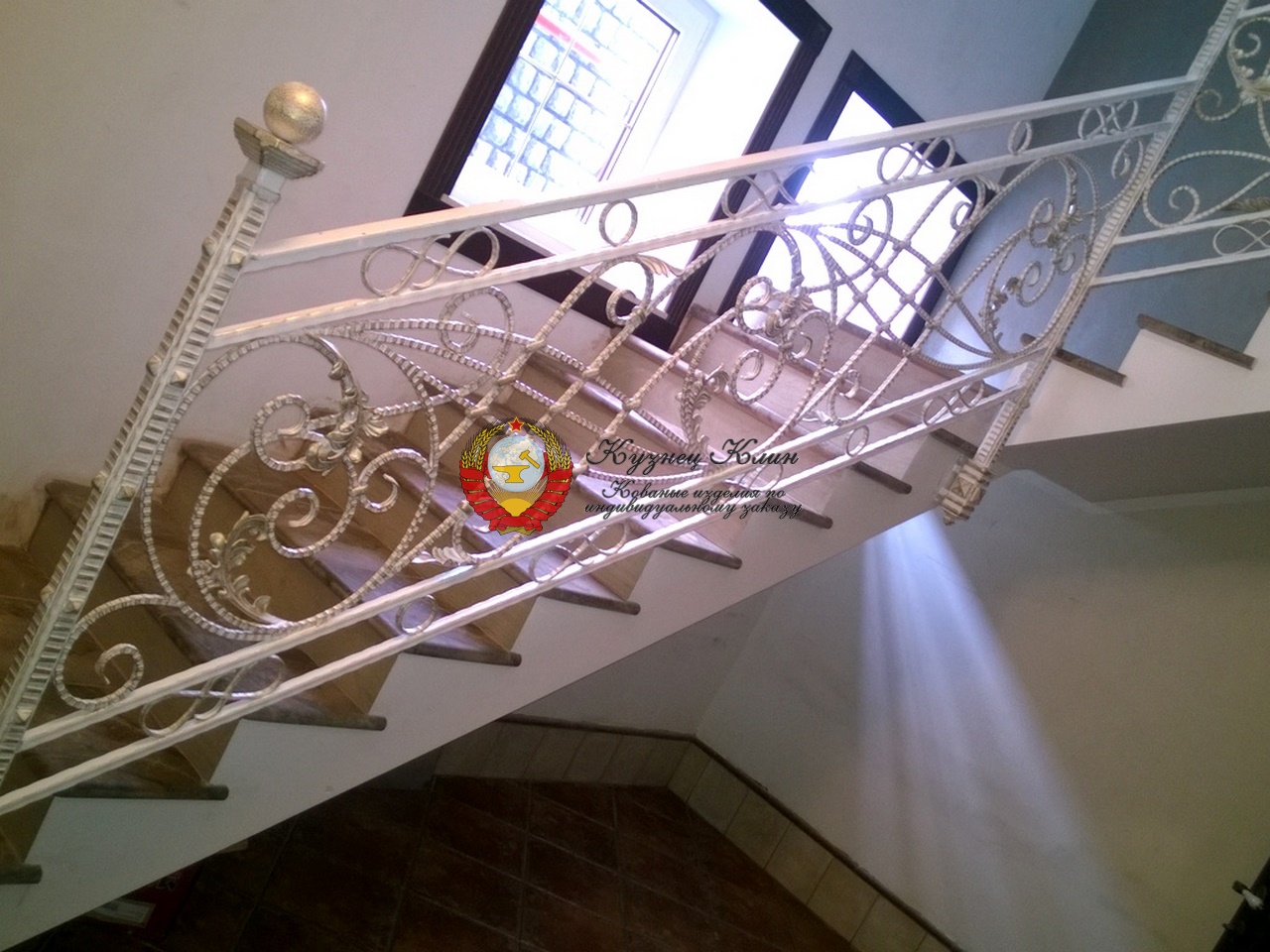 Кованые перила с разворотом