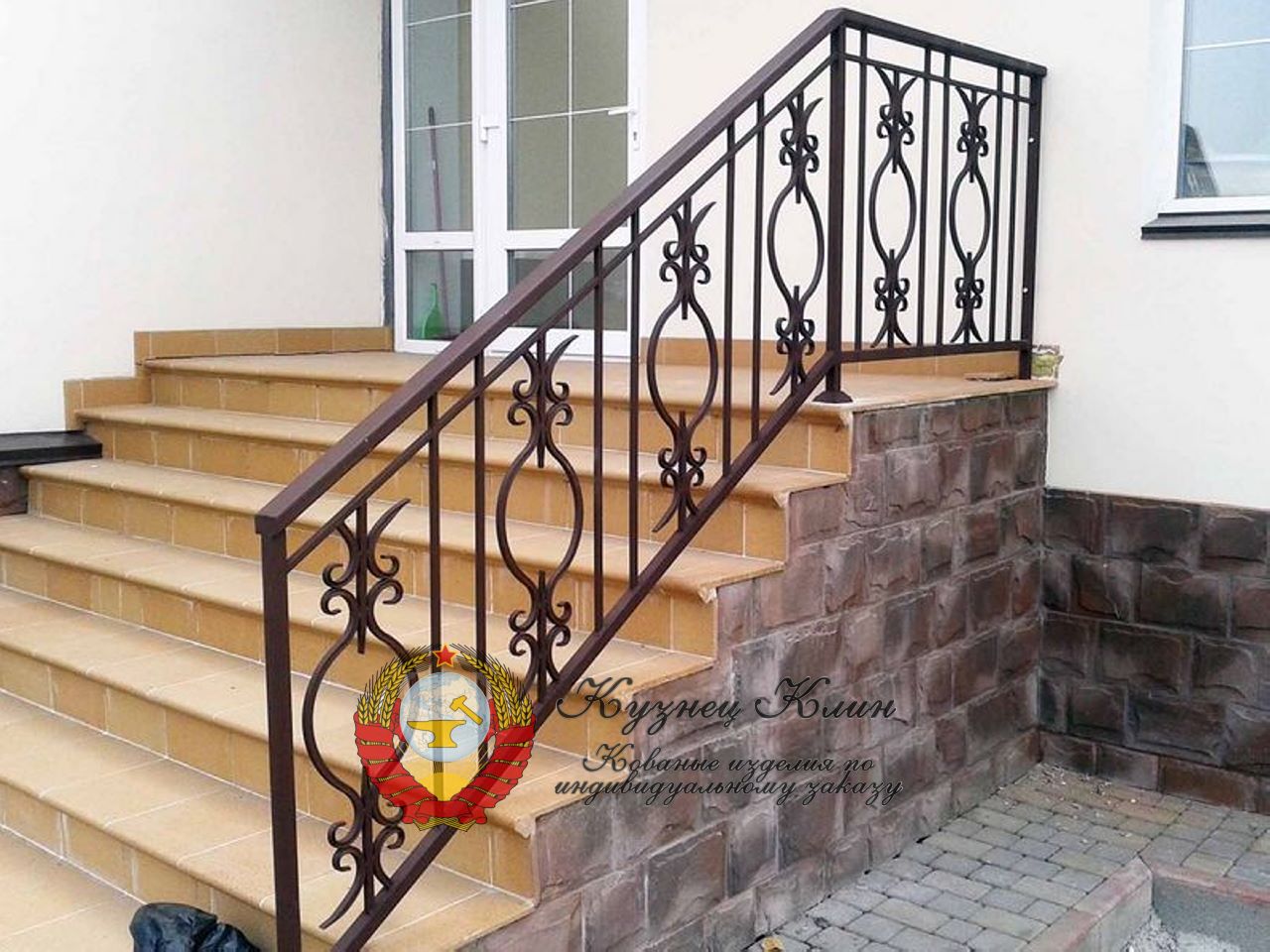 Кованые перила с кпуглыми балясинами